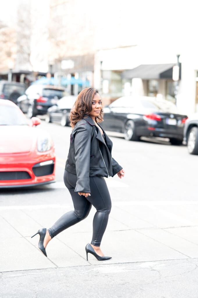 African American Women walking across the street in spanx wearing McCalls 8121 moto jacket