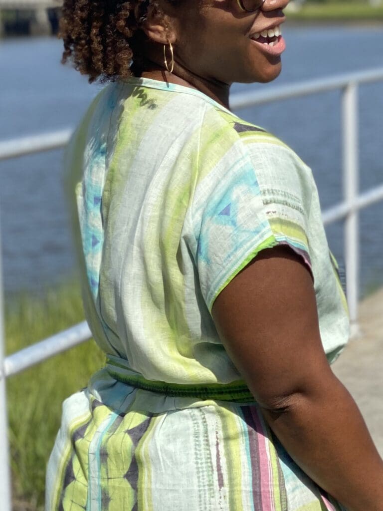 African American woman wearing the zadie jumpsuit by paper theory