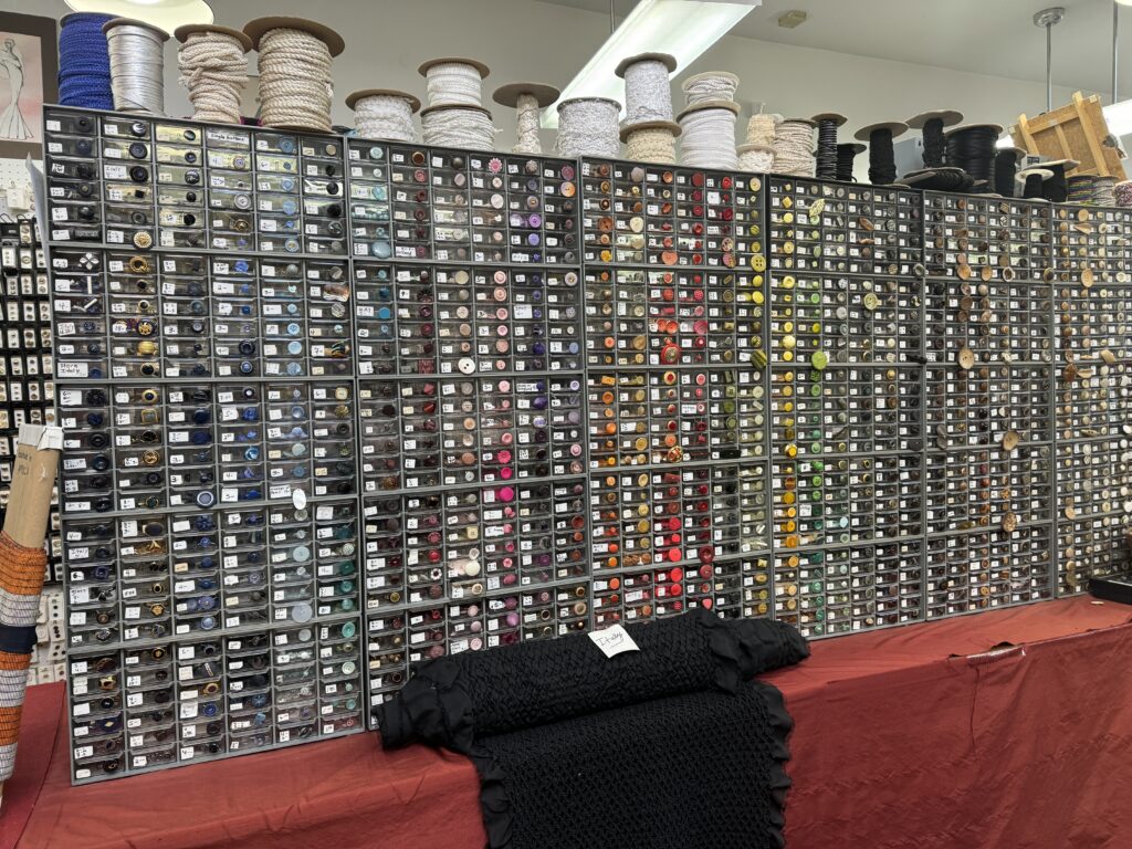 button wall at Promenade Fine fabrics