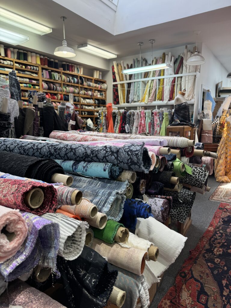 Mounds of fabric at Promenade fine fabrics